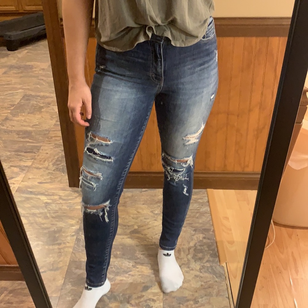 Buckle ripped high rise skinny jeans